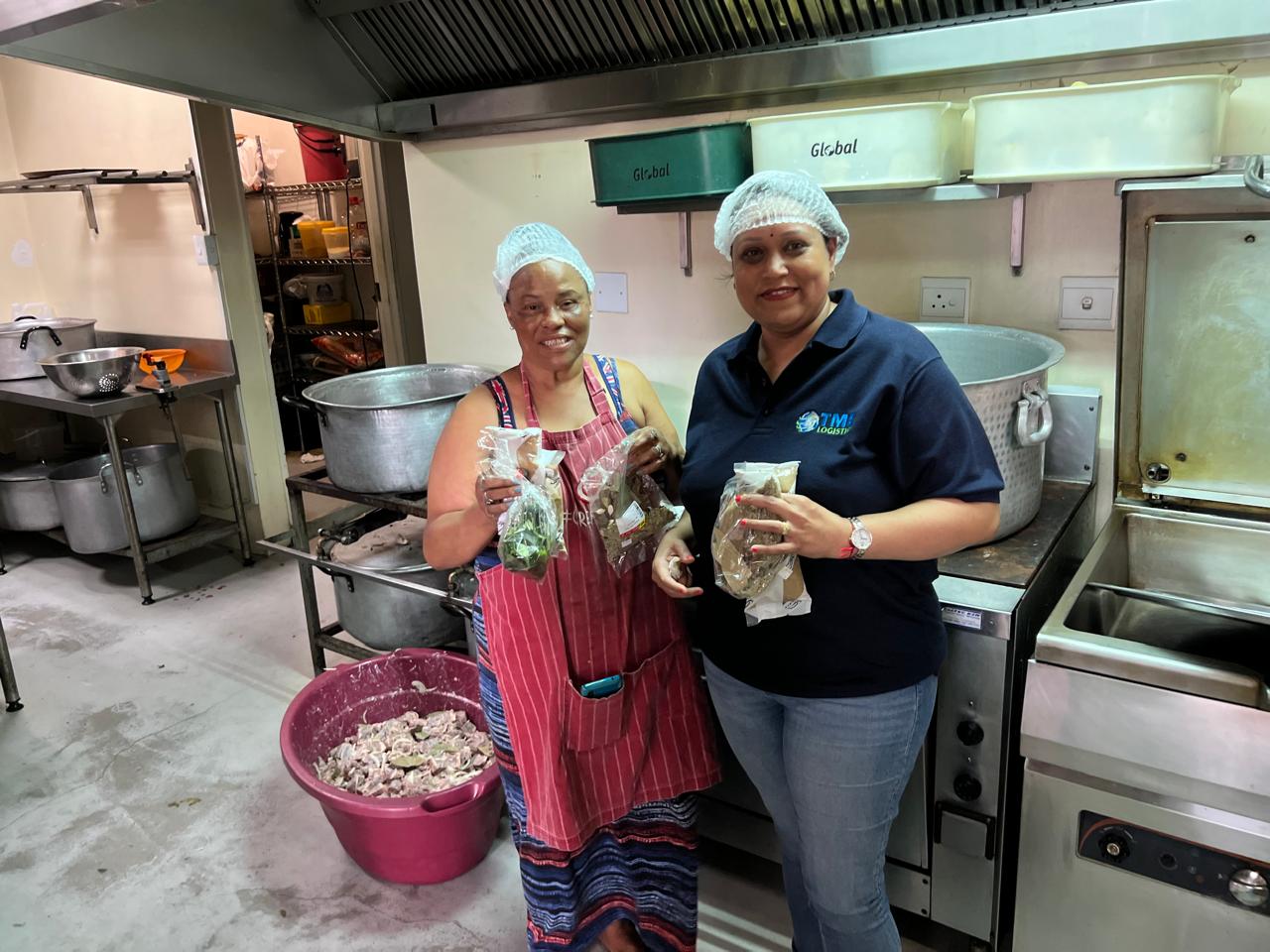 TME Logistics team preparing food for community feeding scheme